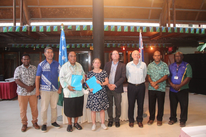 Permanent Secretary of the Ministry of Foreign Affairs and External Trade, Mr. Collin Beck and Chief Air Rights Negotiator and Principal Adviser of the Ministry of Transport from New Zealand Ms Sonya van der Geer with New Zealand High Commissioner to the Solomon Islands, Jonathan Schwass, and Senior Solomon Islands and New Zealand Government officials and Solomon Airlines representative after the initializing of the new agreement last night.