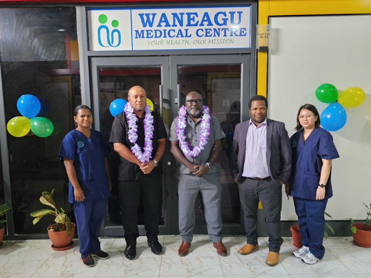 Hon. Tozen Leokana and HC Soaki with Dr Evis and staff of Waneagu Medical Centre.